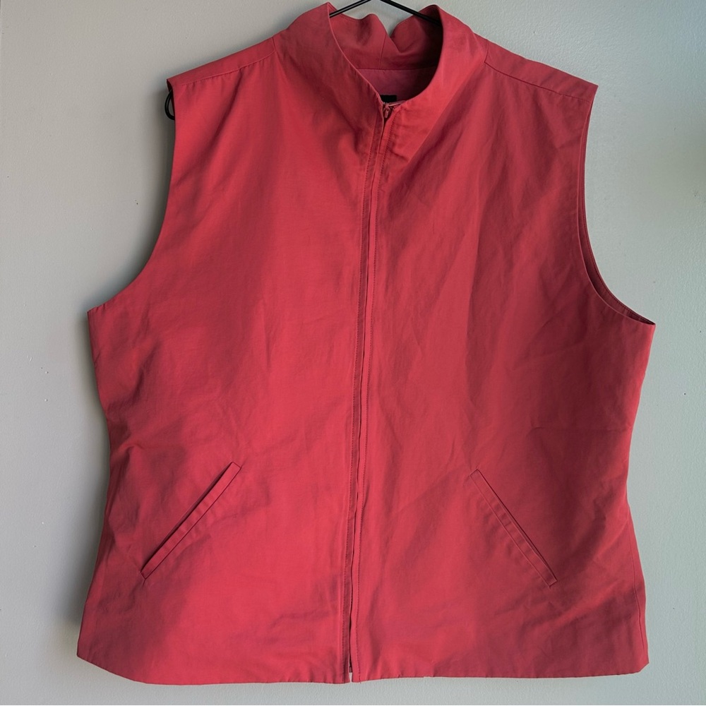 EILEEN FISHER lightweight zip funnel neck vest with slant pockets.